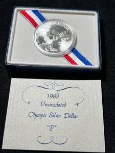 lot 100 image: 1983 US UNC OLYMPIC SILVER DOLLAR