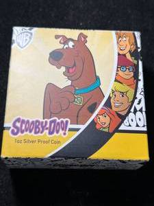 lot 102 image: 1 TROY OZ .999 FINE SILVER 2018 SCOOBY DOO COMMEM ROUND