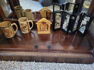 lot 59 image: Vintage Hand Carved Cork Panels, Olive Wood Hand Carved Nativity Scene, and Souvenir Mugs