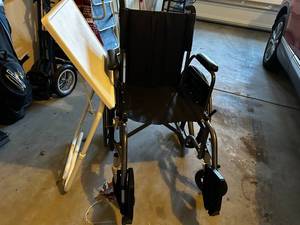 lot 147 image: Lightweight Portable Wheelchair