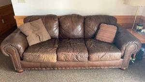 lot 264 image: Used Brown Leather Sofa with Nailhead Trim and Throw Pillows