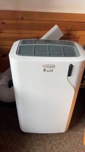 lot 243 image: DeLonghi Pinguino Portable Air Conditioner with Exhaust Hose