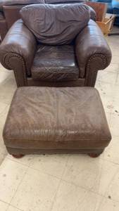 lot 62 image: Brown Leather Armchair and Ottoman Set
