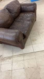 lot 19 image: Used Brown Leather Loveseat with Nailhead Trim