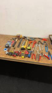 lot 40 image: Comprehensive Set of Hand Tools Including Hammers, Pliers, and Screwdrivers