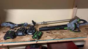 lot 13 image: EGO 765 CFM Leaf Blower and String Trimmer Set with Batteries and Charger