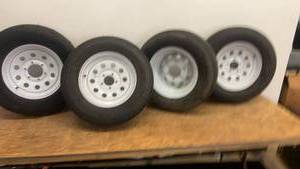 lot 87 image: Set of 4 Pre-Mounted Trailer Tires on Steel Wheels - ST20575R15 & ST22575R15
