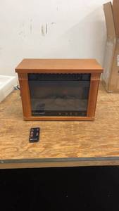 lot 92 image: Heat Surge Electric Fireplace with Remote Control