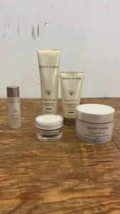 lot 104 image: Body Firm Crpe Erase Skincare Set - 5 Pieces Including Face and Body Treatments