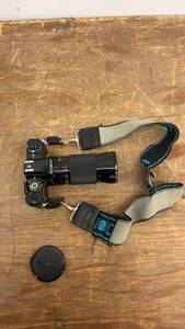 lot 105 image: Soligor Film Camera with Lens, Strap, Tripod, and Vivitar Flash