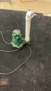 lot 131 image: Zoeller Model 1450 Sump Pump with PVC Pipe
