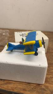 lot 158 image: Sigrid Wallace Yellow Airplane Ornament