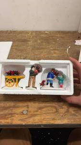 lot 160 image: 2014 Department 56 Snow Village Poinsettia Pickers Set of 3 Figurines