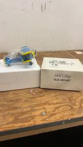 lot 178 image: Department 56 Snow Village Blue Airplane Figurine