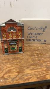 lot 192 image: Department 56 Snow Village Apothecary 1884 Building