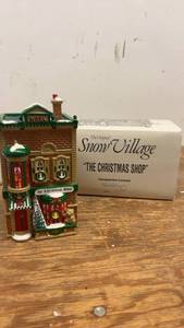 lot 208 image: The Original Snow Village The Christmas Shop Ceramic Figurine 1991