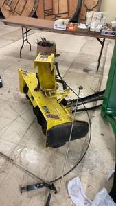 lot 11 image: John Deere 42 Snow Thrower Attachment Model M03252X223559