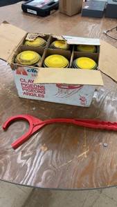 lot 276 image: Box of Clay Pigeons with Thrower Accessory