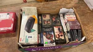 lot 296 image: Large Collection of VHS Tapes with RCA Video Rewinder