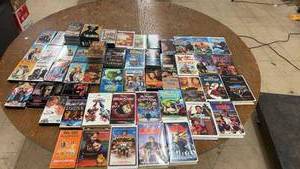 lot 310 image: Collection of 58 Classic VHS Tapes with Family, Animation, and Action Genres