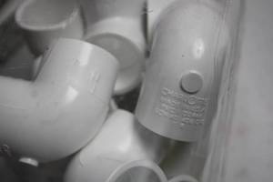lot 87 image: 15 Pack PVC Elbow Pipe Fittings 12 Inch