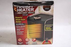 lot 182 image: Handy Heater Instant Heat Pro with Adjustable Speed Settings