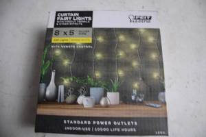lot 285 image: 120 Warm White Curtain Fairy Lights with Remote Control
