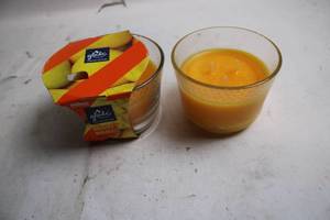lot 371 image: Glade Mighty Mango Scented Candle in Glass Jar