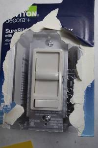 lot 476 image: Leviton Decora SureSlide Light Dimmer, 600W CFLLED Compatible