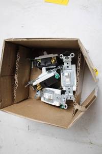 lot 498 image: Lot of Electrical Light Switches and Outlets in Box