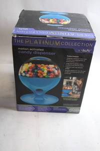 lot 54 image: Motion-Activated Candy Dispenser by the Platinum Collection