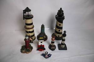 lot 89 image: Collection of 8 Decorative Lighthouse Figurines with Varied Designs