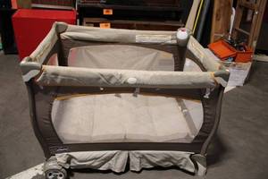 lot 124 image: Chicco Playard with Mesh Sides and Wheels