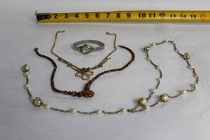 lot 17 image: Collection of Vintage Jewelry Including Watch, Necklaces, and Bracelet