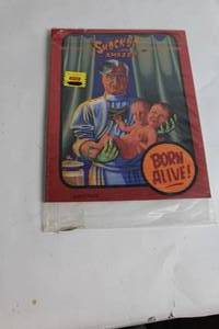 lot 68 image: Unopened Shocked Amazed Comic Book Volume 1