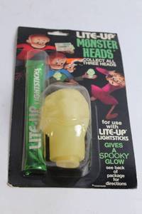 lot 79 image: Vintage Lite-Up Monster Head with Lightstick