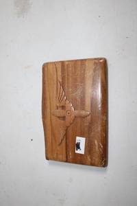 lot 233 image: Wooden Plaque with Carved Winged Design
