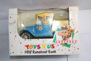 lot 241 image: Vintage 1980s Toys R Us 1918 Runabout Bank Toy Car