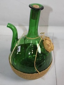 lot 261 image: Vintage Green Glass Wine Carafe with Raffia Trim