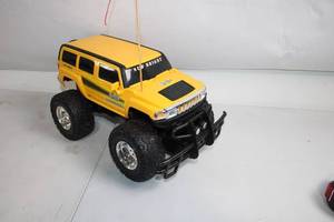 lot 302 image: New Bright Yellow RC Hummer Toy Truck with Large Wheels