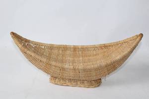 lot 318 image: Large Handwoven Wicker Basket with Curved Design