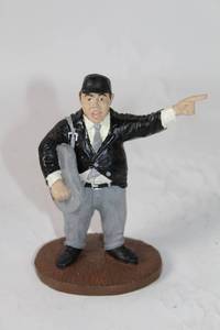 lot 324 image: Vintage Figurine of Man Pointing with Bag
