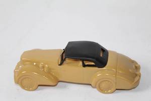 lot 358 image: Collectible Avon Tan Winds Model Car Figurine
