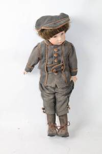 lot 414 image: Vintage Porcelain Boy Doll with Handmade Outfit