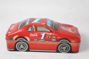 lot 465 image: Coca-Cola Racing Car Shaped Collectible Tin Box