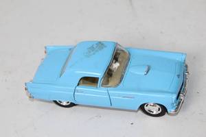 lot 470 image: Vintage Blue Diecast Model Car with Minor Wear