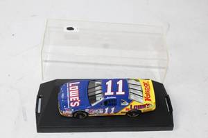 lot 477 image: 124 Scale Lowes Racing Diecast Model Car with Display Case
