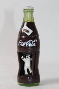 lot 480 image: Vintage Coca-Cola Bottle Bank with Polar Bear Figure