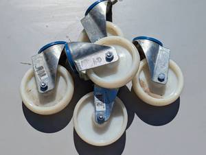 lot 90 image: Set of five 6-in hard poly smooth glide caster wheels by torwag