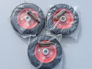 lot 84 image: Set of three red tank Wheels with bolt